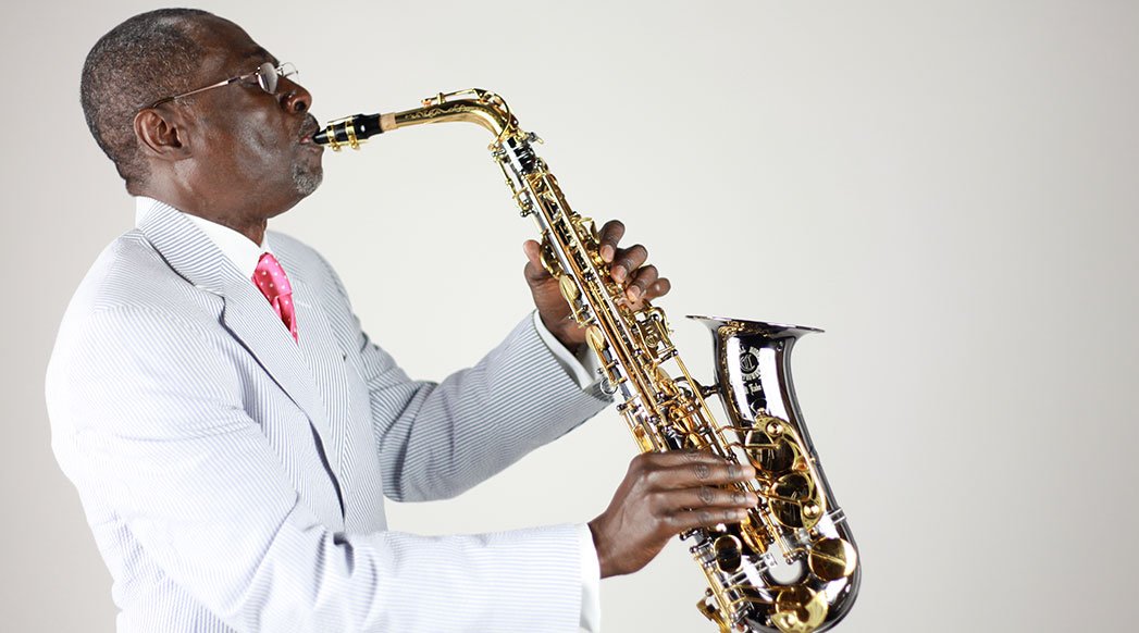 eugene-playing-sax bio-pic